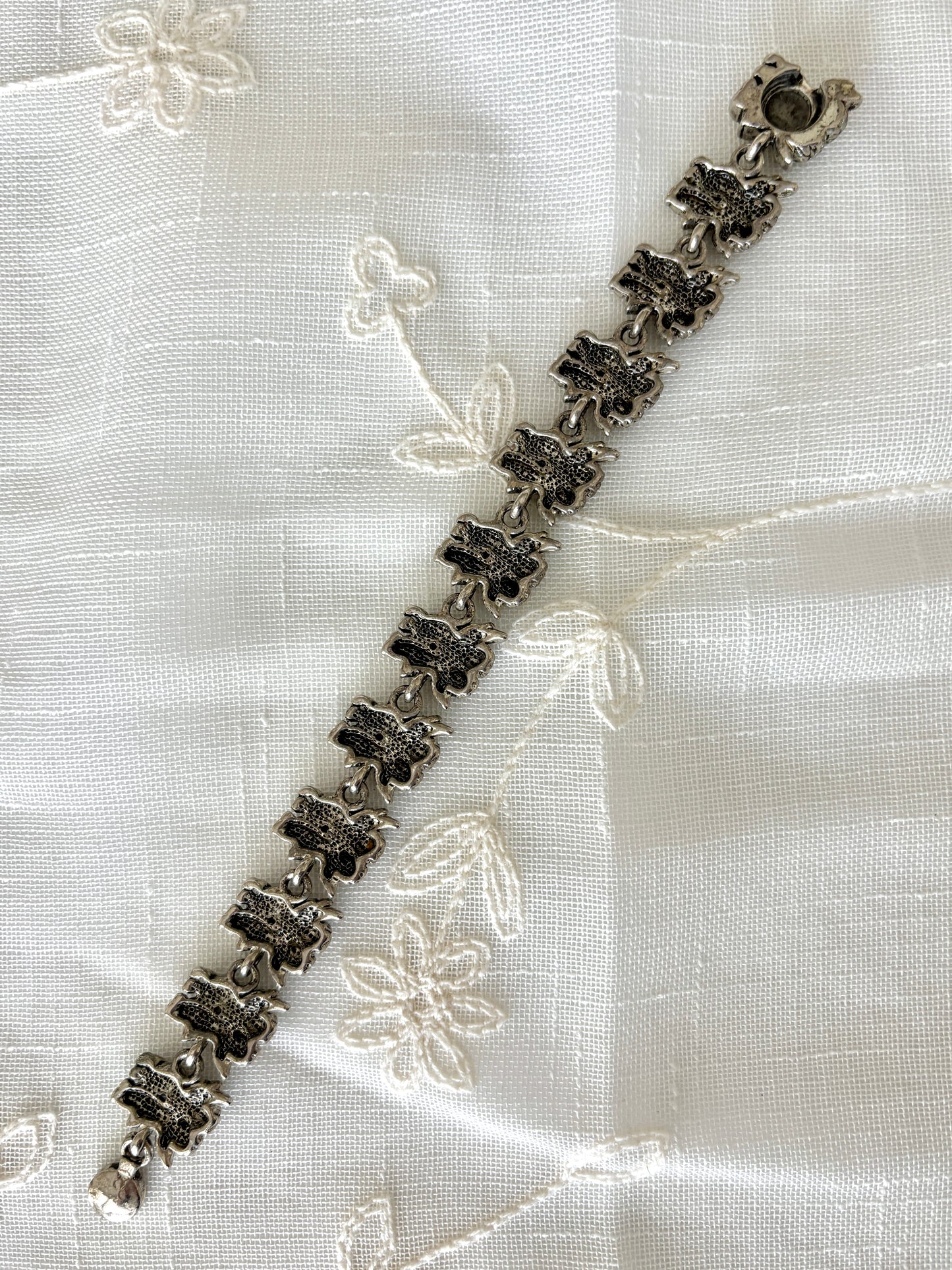 Hugging Angels Silver Tone Bracelet