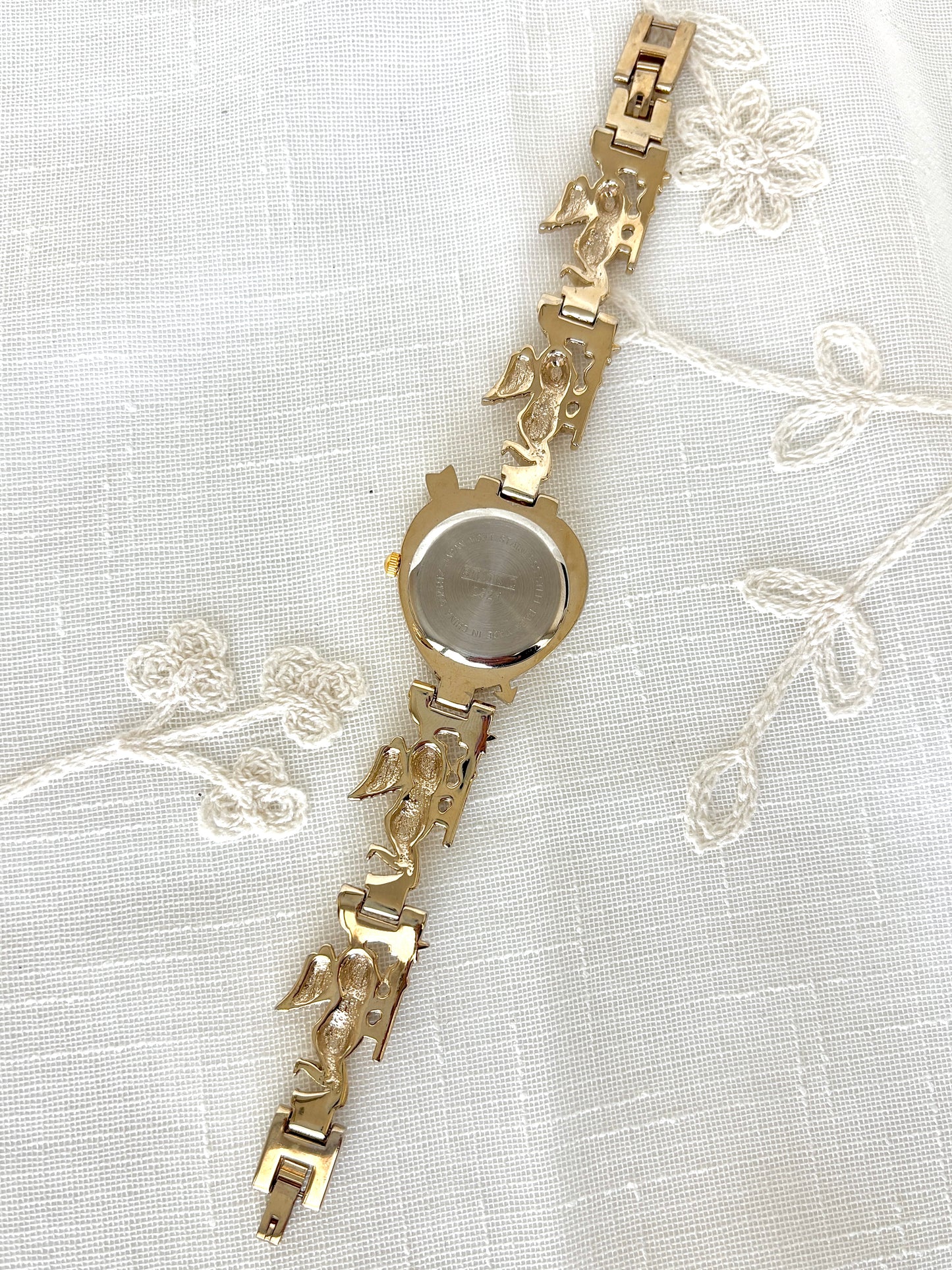 Studio C Heart-Shaped Bezel Cupid Motif Band Gold Tone Quartz Watch