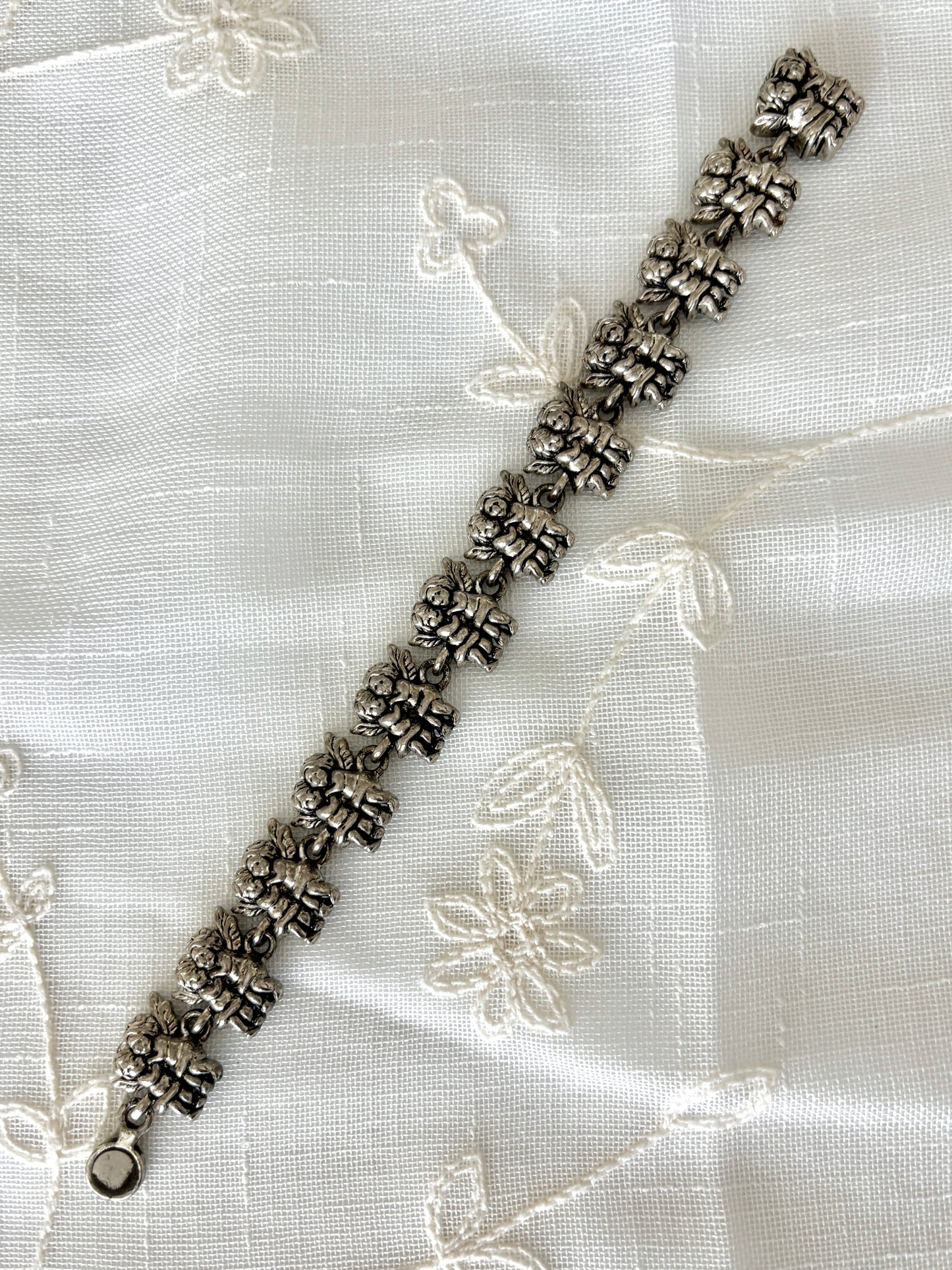 Hugging Angels Silver Tone Bracelet