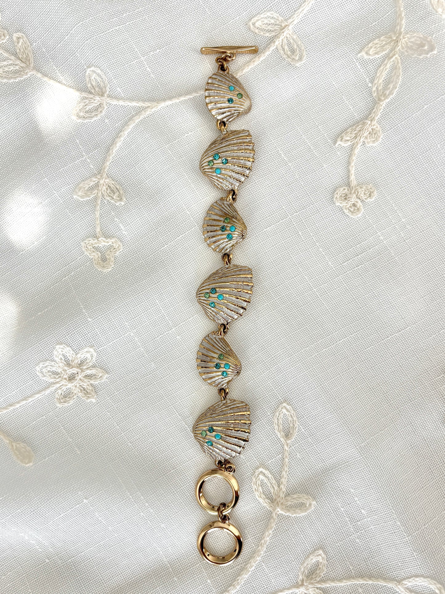 Gold Tone Rhinestone Shell Toggle Bracelet