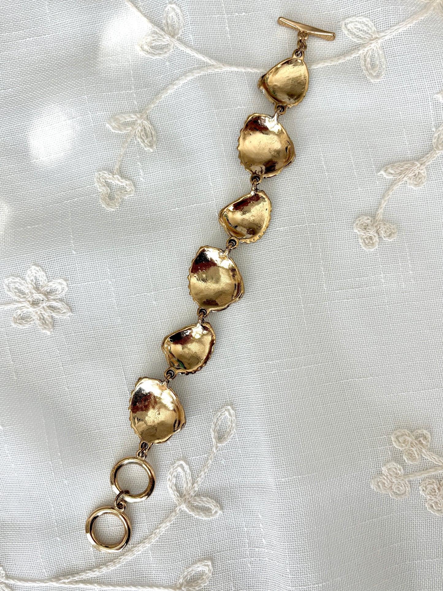 Gold Tone Rhinestone Shell Toggle Bracelet