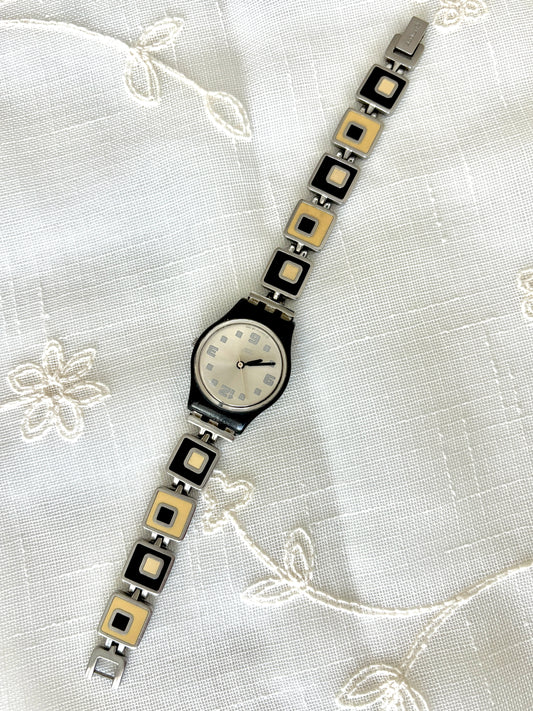 Black and White Swatch Watch