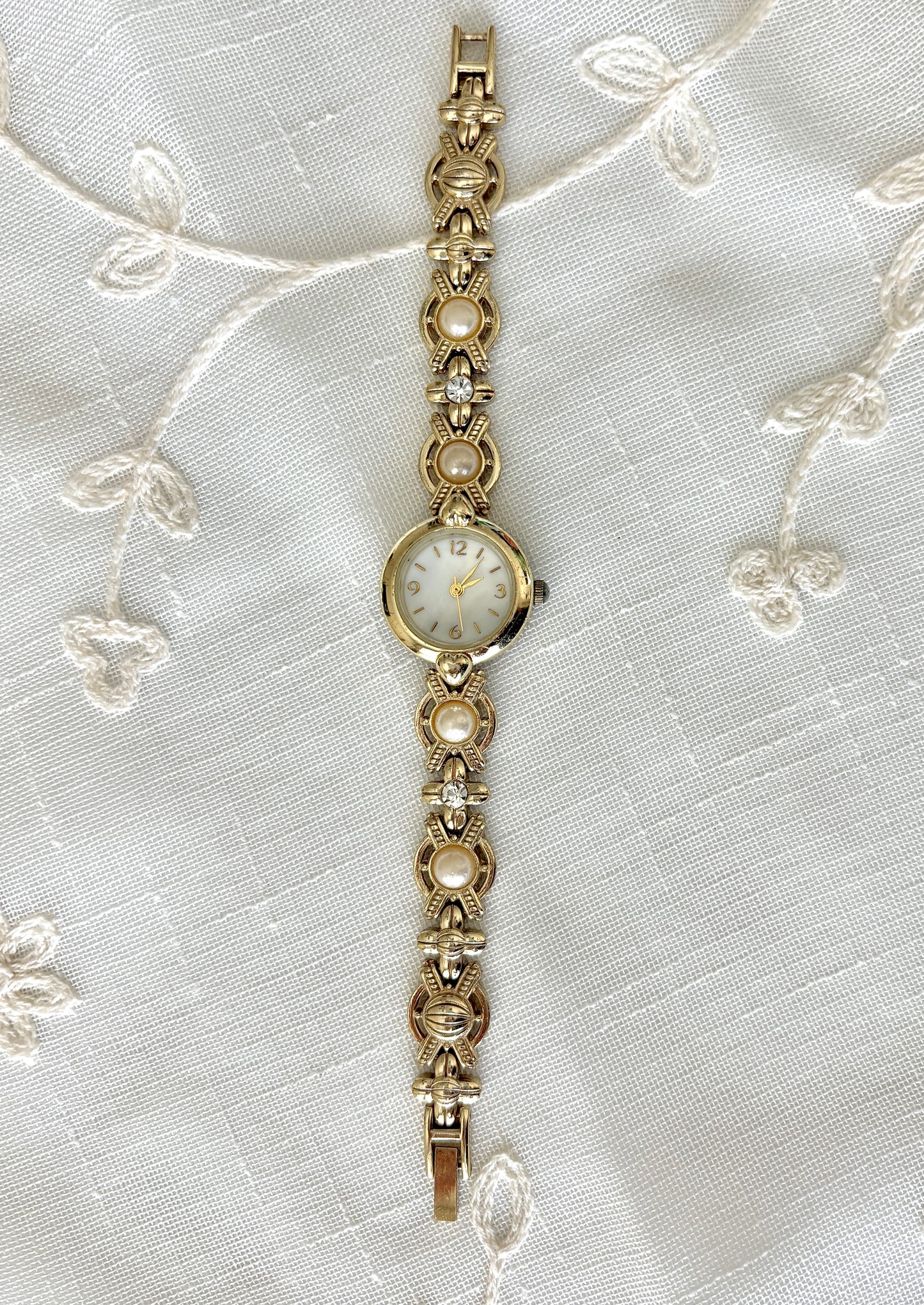 Gold Tone Rhinestone and Pearl Band Watch